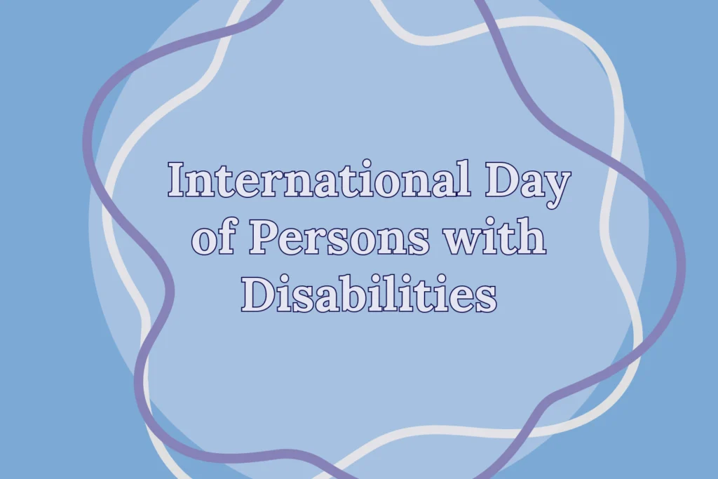 On a blue background, a white circle is in the center with white and purple outlines of blobs with the title “International Day of Persons with Disabilities” in the center.